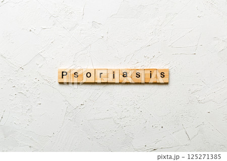 Psoriasis word written on wood block. Psoriasis text on table, concept Psoriasis word written on wood block. Psoriasis text on table, concept 125271385