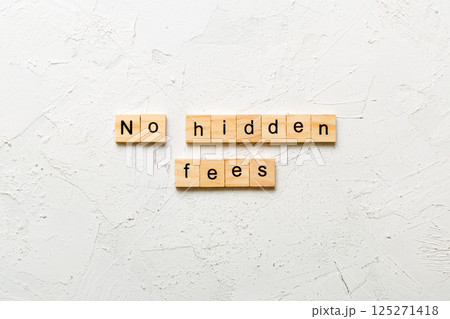 no hidden fees word written on wood block. no hidden fees text on table, concept no hidden fees word written on wood block. no hidden fees text on table, concept 125271418