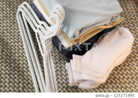 folded casual clothes, socks, tshirts 125271995
