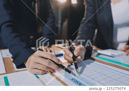 Business analyze,Close up Business people meeting to discuss the situation on the market. Business Financial Concept Business analyze,Close up Business people meeting to discuss the situation on the market. Business Financial Concept 125275074