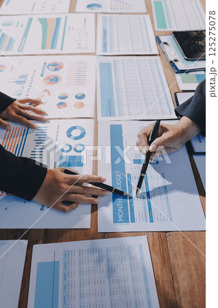 Business analyze,Close up Business people meeting to discuss the situation on the market. Business Financial Concept Business analyze,Close up Business people meeting to discuss the situation on the market. Business Financial Concept 125275078