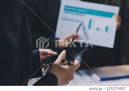 Business analyze,Close up Business people meeting to discuss the situation on the market. Business Financial Concept Business analyze,Close up Business people meeting to discuss the situation on the market. Business Financial Concept 125275087