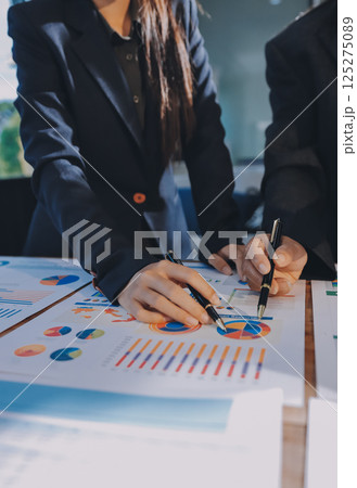 Business analyze,Close up Business people meeting to discuss the situation on the market. Business Financial Concept Business analyze,Close up Business people meeting to discuss the situation on the market. Business Financial Concept 125275089