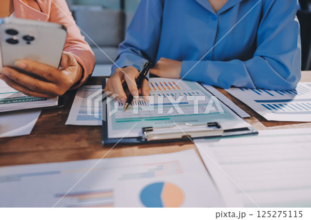 Business analyze,Close up Business people meeting to discuss the situation on the market. Business Financial Concept Business analyze,Close up Business people meeting to discuss the situation on the market. Business Financial Concept 125275115