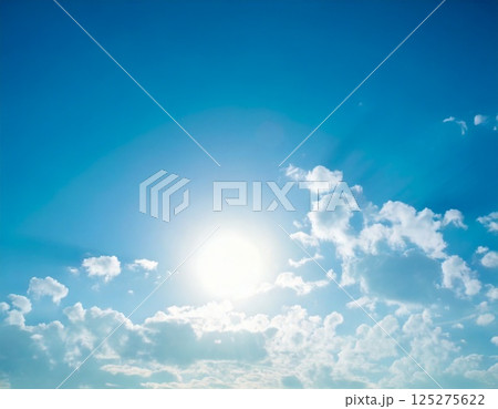 爽やかな青空と白い雲、輝く太陽の自然風景　blue sky with sun and clouds 125275622