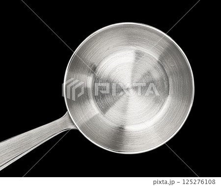 Stainless steel ladle isolated on black background, top view 125276108