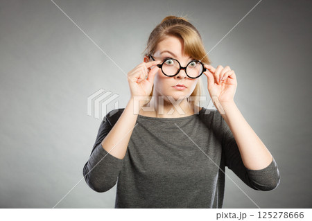Surprised astonished girl with open mouth. Surprised astonished girl with open mouth. 125278666