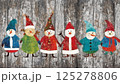Christmas decorations and gifts on an wooden background for new year celebrations, winter fairy tale 125278806