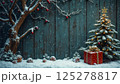 Christmas tree and decorations and gifts on an wooden background for new year celebrations, winter fairy tale 125278817