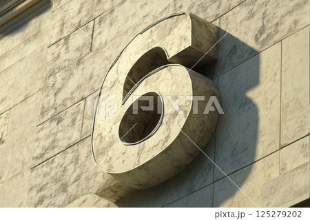 A large number 6 is carved into a stone wall 125279202