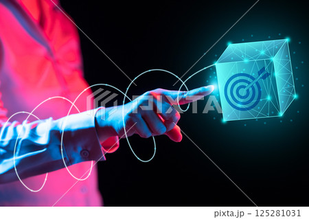 Businessperson touching target goal icons on a wireframe cube. Data management system. Smart corporate and technology innovation on the virtual screen. Concept of business, finance, and global network 125281031