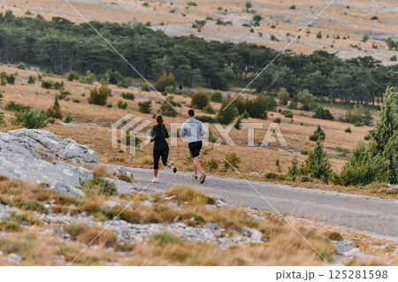 A Couple's Energizing Morning Run in the Mountains A Couple's Energizing Morning Run in the Mountains 125281598