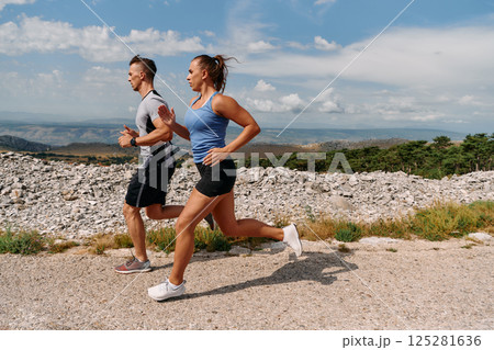 Mountain Bliss: Capturing the Joy of Morning Trail Running Mountain Bliss: Capturing the Joy of Morning Trail Running 125281636