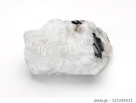 Polished oval moonstone cabochon displaying a soft blue adularescence and subtle internal inclusions, set against a dark background 125284331