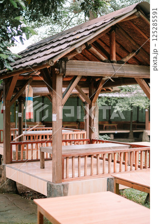wooden gazebo in the forest wooden gazebo in the forest 125285591