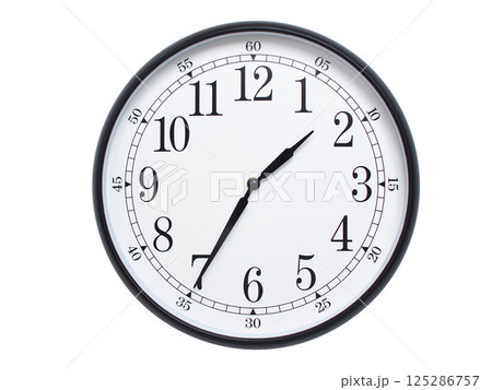 Round wall clock with black frame showing time at 01:35 or 13:35. Ideal for concepts of time or scheduling. 125286757