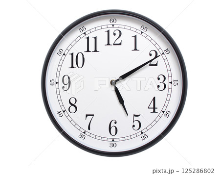 Round wall clock with black frame showing time at 05:10 or 17:10. Ideal for concepts of time or scheduling. Round wall clock with black frame showing time at 05:10 or 17:10. Ideal for concepts of time or scheduling. 125286802
