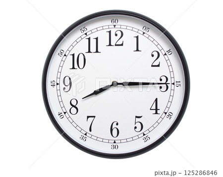 Round wall clock with black frame showing time at 08:15 or 20:15. Ideal for concepts of time or scheduling. 125286846