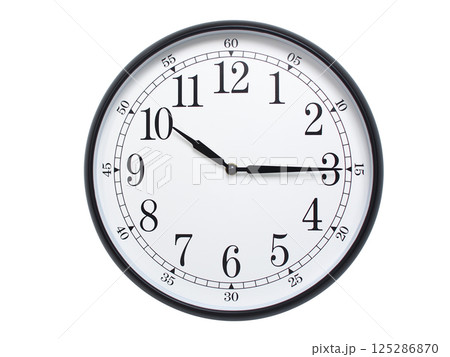 Round wall clock with black frame showing time at 10:15 or 22:15. Ideal for concepts of time or scheduling. 125286870