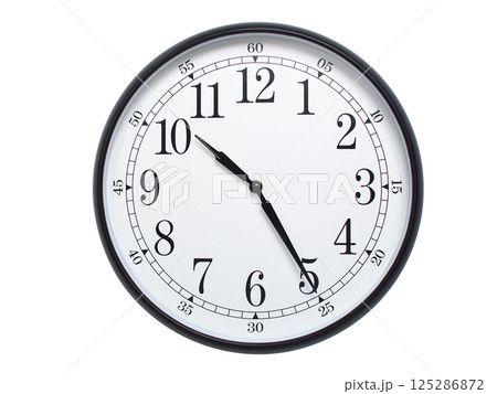 Round wall clock with black frame showing time at 10:25 or 22:25. Ideal for concepts of time or scheduling. 125286872