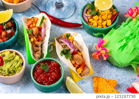 Cinco de Mayo concept with traditional Mexican food Cinco de Mayo concept with traditional Mexican food 125287730