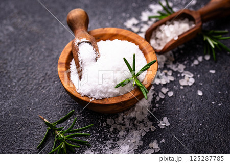 Natural sea salt crystals on dark background 125287785