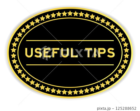 Black and gold color oval label sticker with word useful tips on white background Black and gold color oval label sticker with word useful tips on white background 125288652