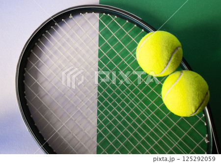 Racket and balls set on green and white background, flat lay. Isolated. 125292059