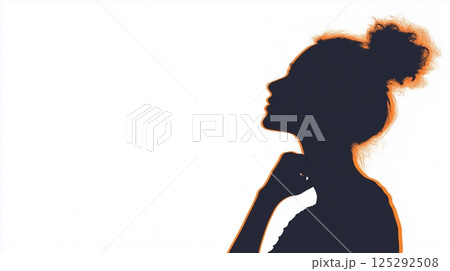 Thoughtful woman in profile silhouette 125292508