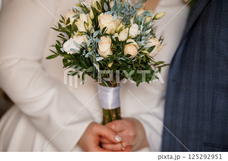 Elegant Bridal Bouquet with Soft Roses in Romantic Setting Elegant Bridal Bouquet with Soft Roses in Romantic Setting 125292951