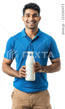 Smiling Young Man Showing a Glass Milk Bottle, Healthy Lifestyle Concept 125293471