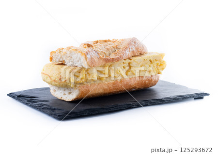Spanish potato omelette sandwich isolated on white background Spanish potato omelette sandwich isolated on white background 125293672