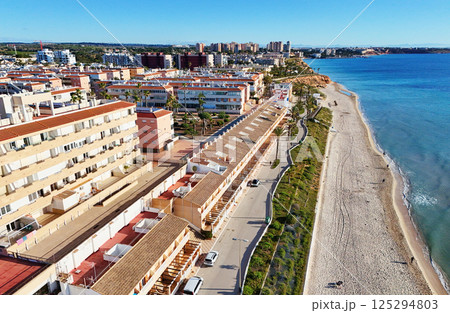 Aerial shot of spanish resort town of Mil Palmeras. Costa Blanca. Spain 125294803