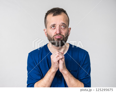 Man begging or apologizing Man begging or apologizing 125295675