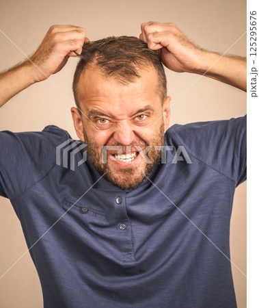 Crazy mad adult man Crazy mad adult man 125295676