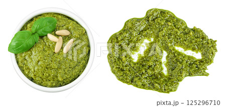 Pesto sauce in ceramic bowl isolated on white background. Top view. Flat lay. 125296710