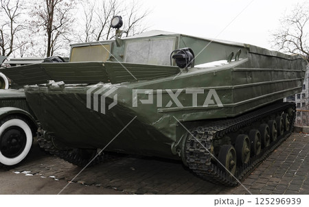 Kiev, Ukraine December 10, 2020: Tracked floating transporter K-61 in the Museum of Military Equipment for public viewing Kiev, Ukraine December 10, 2020: Tracked floating transporter K-61 in the Museum of Military Equipment for public viewing 125296939