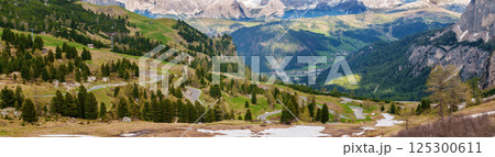 Majestic mountain valley landscape with serene village and winding road near Valley of Funes at Dolomites, Italy Majestic mountain valley landscape with serene village and winding road near Valley of Funes at Dolomites, Italy 125300611