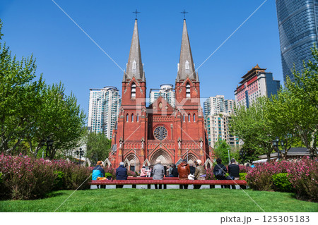 Chinese people at garden by St. Ignatius Xujiahui Cathedral, Shianghai Chinese people at garden by St. Ignatius Xujiahui Cathedral, Shianghai 125305183