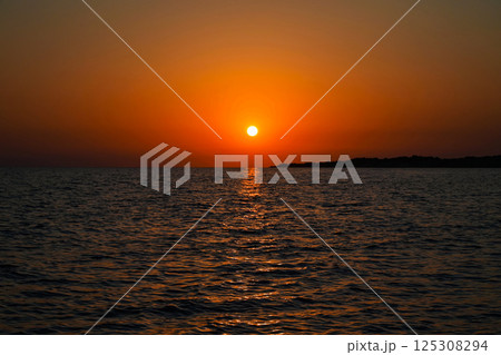 Beautiful sunset on the sea. Concept for travel, summer and vacation. 125308294