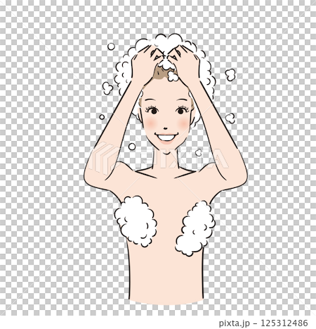 A woman lathering shampoo and washing her hair thoroughly 125312486