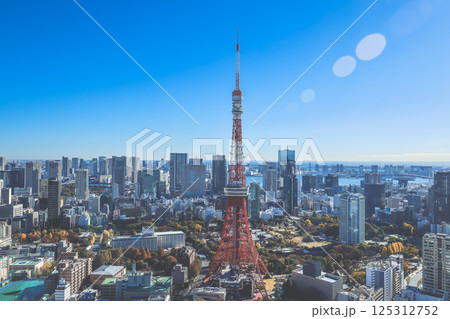 Urban Cityscape Featuring Iconic Red Tower and Skyscrapers, Tokyo Dec 9 2024 Urban Cityscape Featuring Iconic Red Tower and Skyscrapers, Tokyo Dec 9 2024 125312752