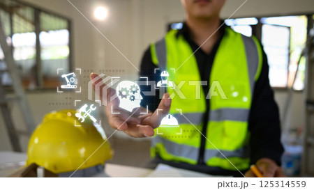 Smart construction technology concept with engineer activating virtual engineering tools Smart construction technology concept with engineer activating virtual engineering tools 125314559