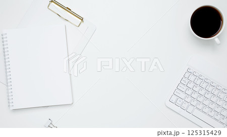 Office workspace and productivity concept. Mock up notebook. Flat lay composition with copy space 125315429