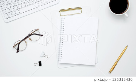 Flat lay composition with copy space. Mock up notebook. Office workspace and productivity concept 125315430