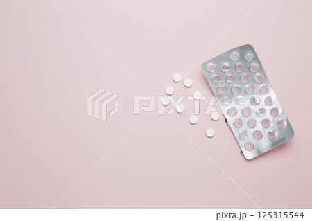 Blister of tablets with pills. Concept of medicine, healthcare, and pharmaceutical industry Blister of tablets with pills. Concept of medicine, healthcare, and pharmaceutical industry 125315544