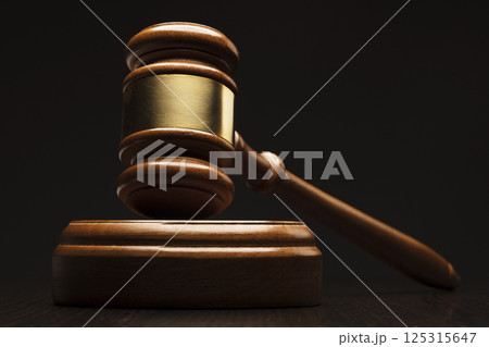 Wooden gavel on black background Wooden gavel on black background 125315647