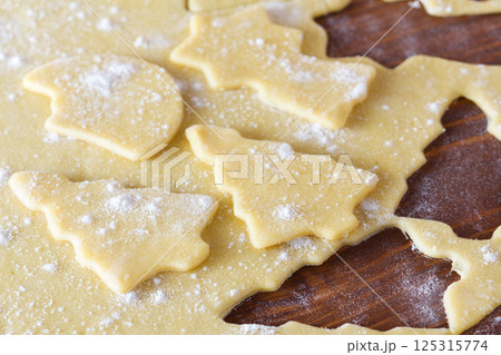 Christmas dough with baking ingredient 125315774