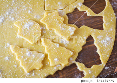 Christmas dough with baking ingredient Christmas dough with baking ingredient 125315775