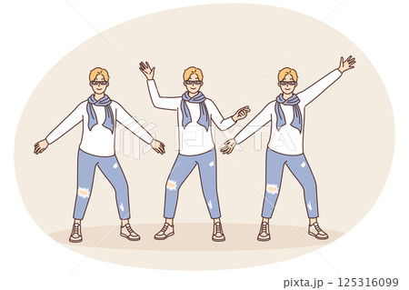 Creative guy in youth fashion clothes posing taking different poses and spreading arms to sides 125316099